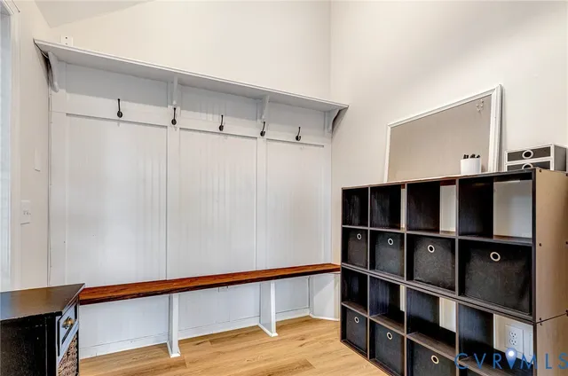 a view of a room with shelves on the wall