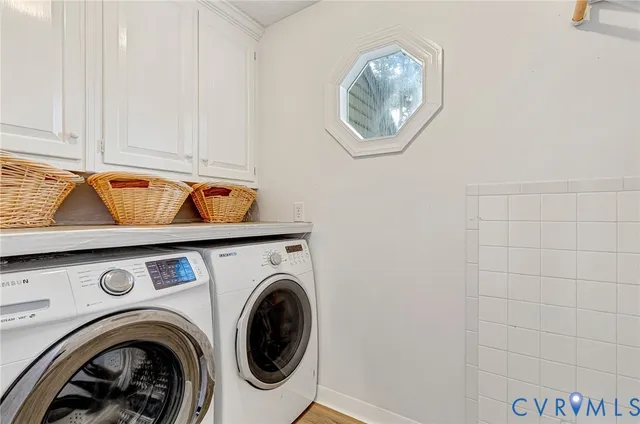 a view of livingroom with washer and dryer
