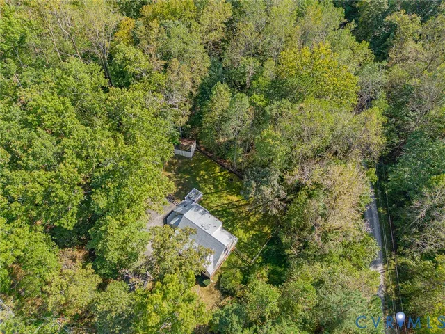 a view of a house with a tree