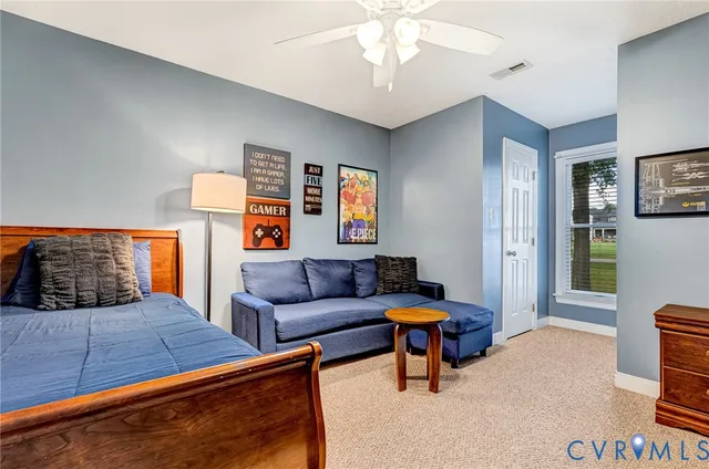 a living room with furniture and a couch