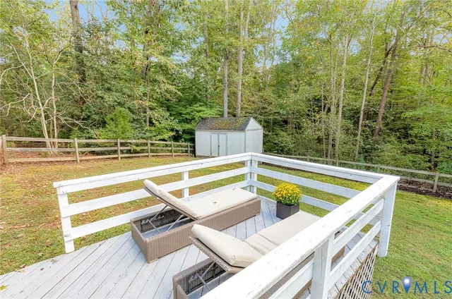 a view of a chairs and table on the wooden floor