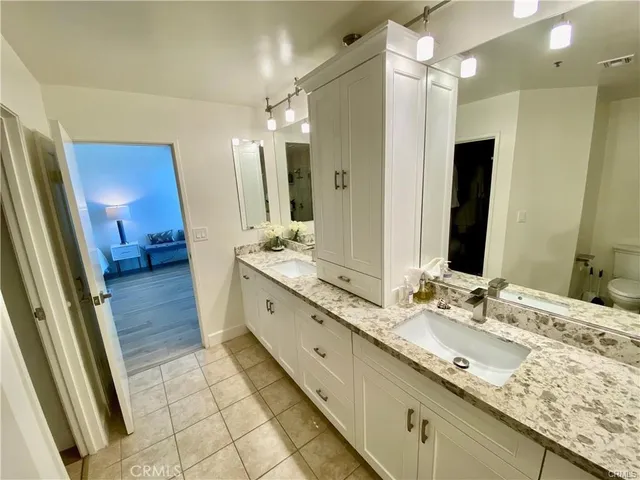a view of a bathroom with a glass shower door