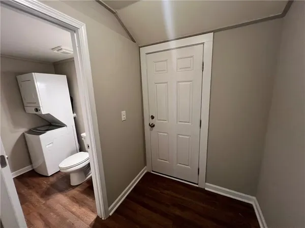 a bathroom with a toilet and a sink