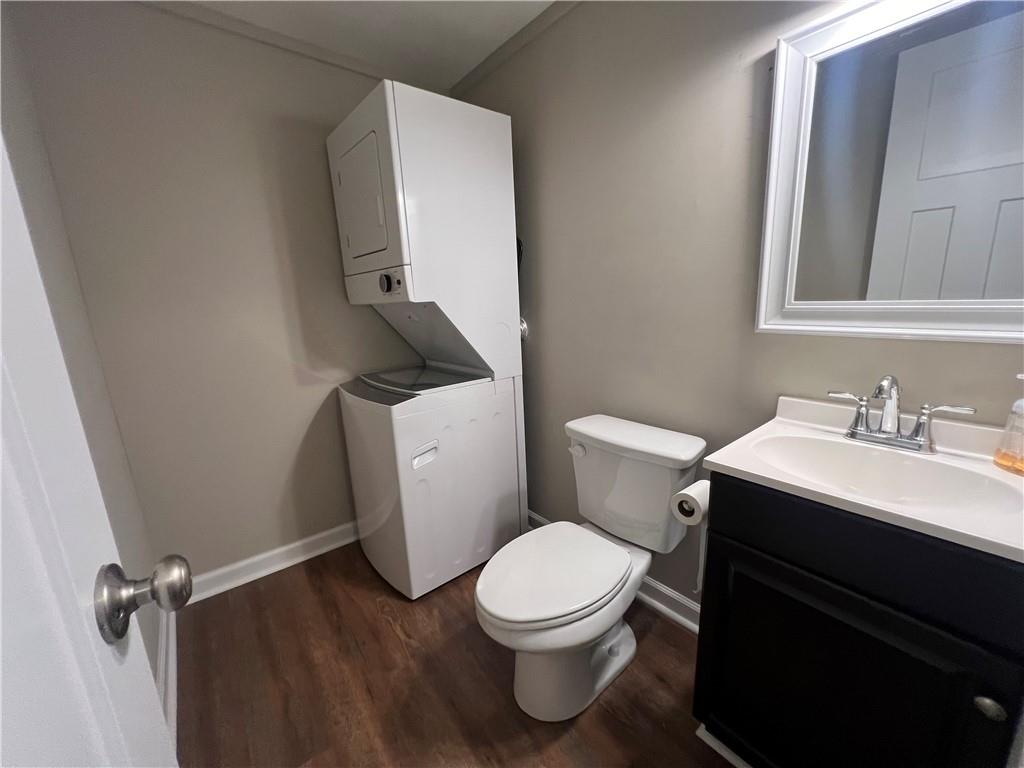 48 Quarry Street Gainesville, GA 30501 - Photo 5 of 9 a bathroom with a sink and a toilet