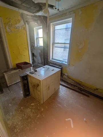 a room with furniture and window