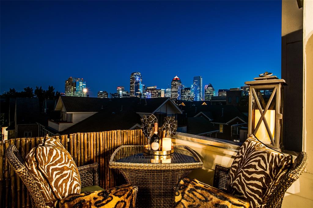 a terrace of a house with outdoor seating