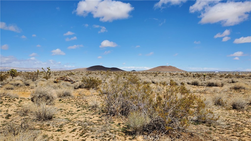 0 Reed Avenue Mojave, CA 93501 - Photo 12 of 18 a view of a large window with a mountain in the background