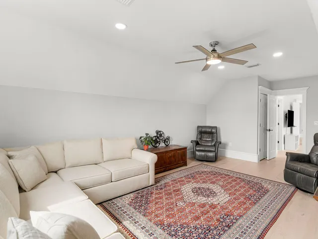 a kitchen with stainless steel appliances granite countertop a sink a stove and cabinets
