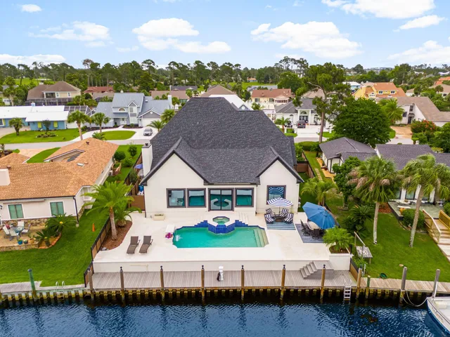 a view of a golf course with a lake