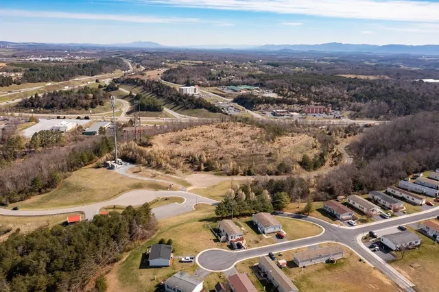 a view of a city with mountains in the background