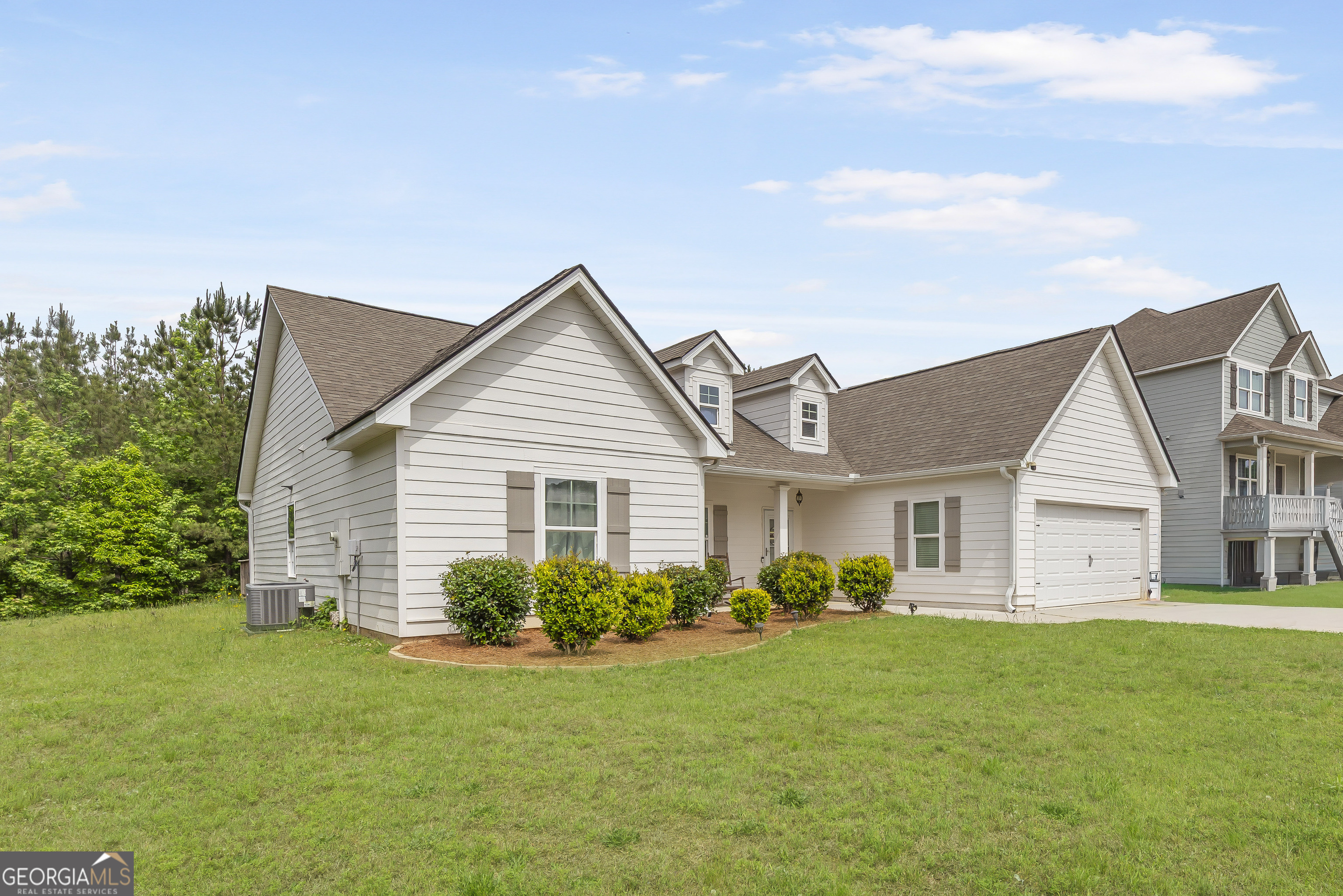 370 Springwater Way Bremen, GA 30110 - Photo 3 of 32 a view of a house with a yard and potted plants