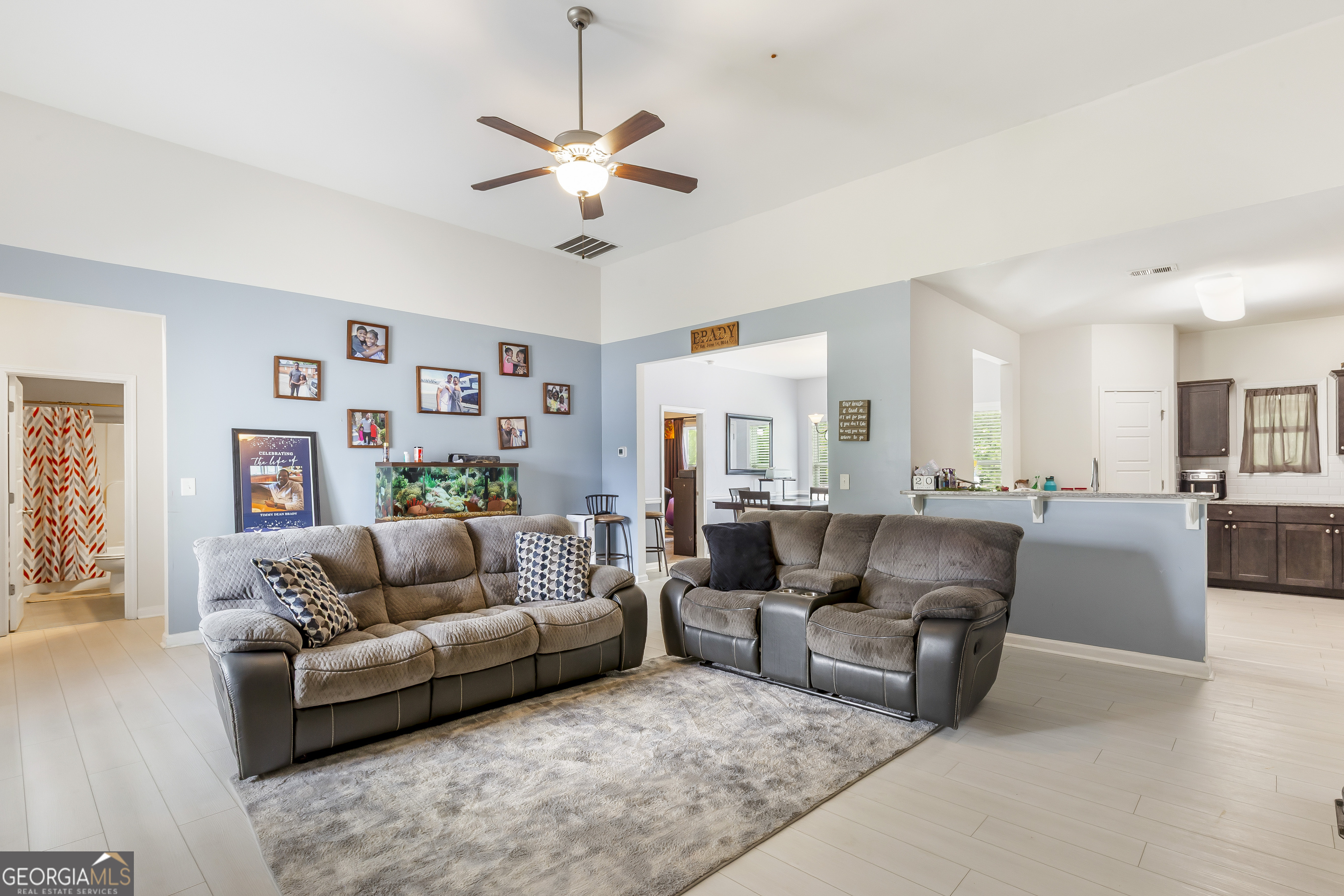 370 Springwater Way Bremen, GA 30110 - Photo 8 of 32 a living room with furniture and a view of kitchen