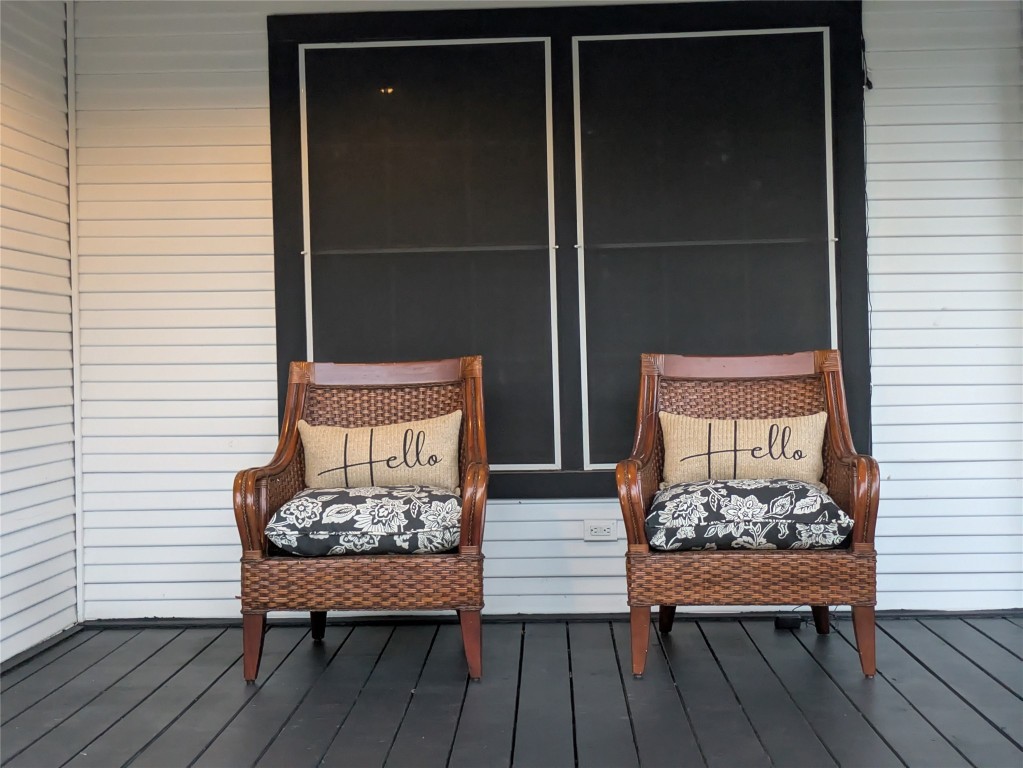 2204 Forest Trail Austin, TX 78703 - Photo 2 of 15 a balcony with wooden floor table and chairs