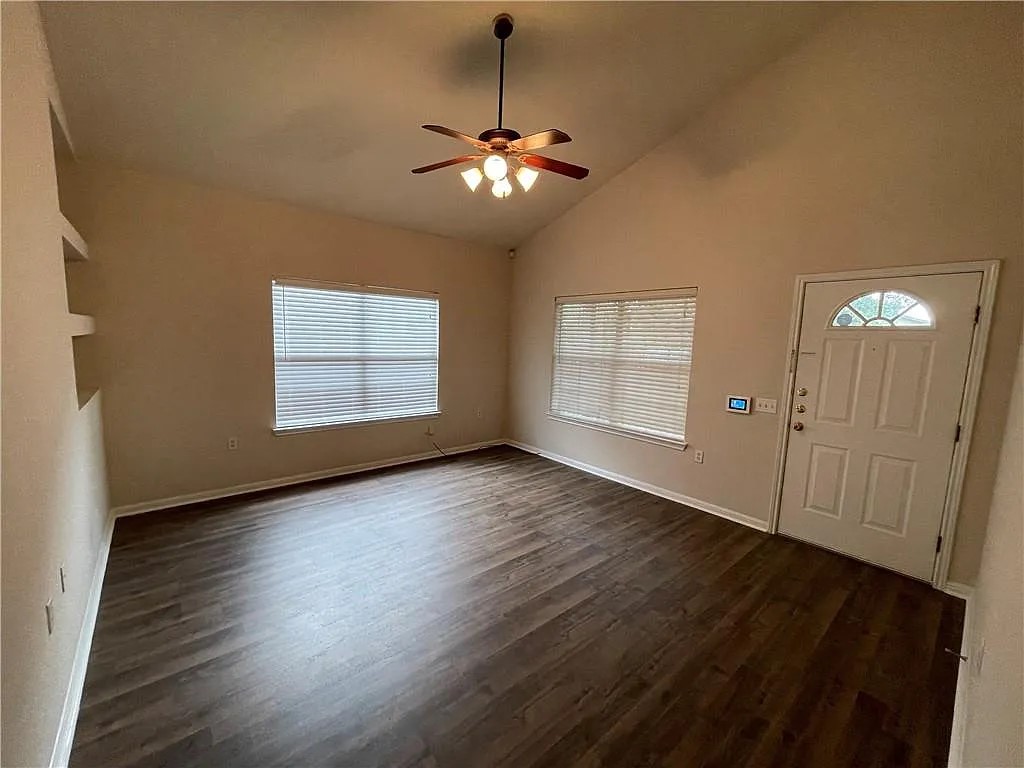 5701 Signal Point Austin, TX 78724 - Photo 2 of 12 Open living space with a vaulted ceiling