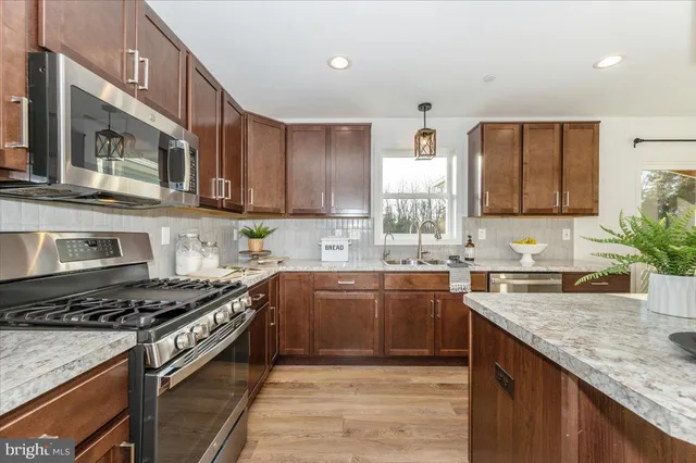 a bedroom with bed and a window