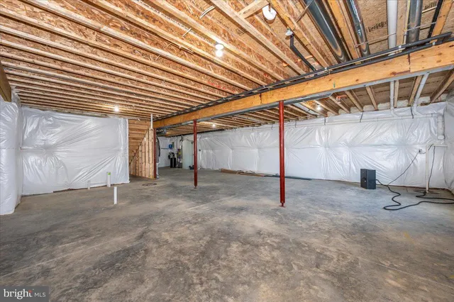 a view of a big yard with large trees