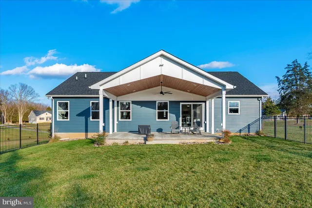a view of a house with a big yard