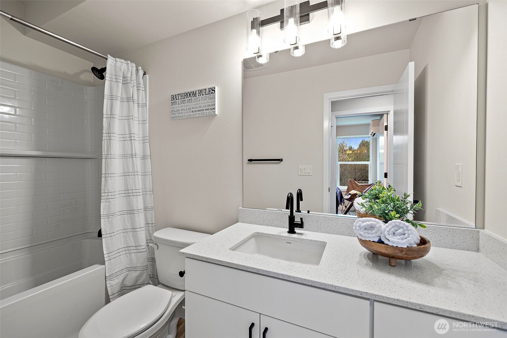 5015 144th Street Southwest, Unit C3 Edmonds, WA 98026 - Photo 28 of 30 a bathroom with a sink a toilet and shower