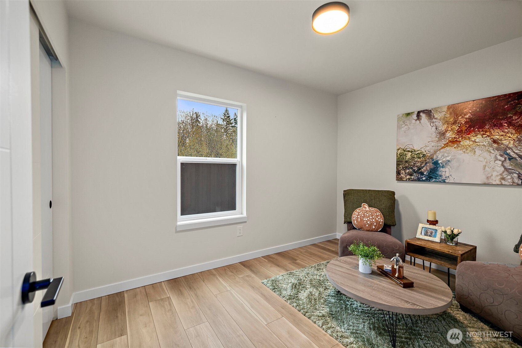 5015 144th Street Southwest, Unit C3 Edmonds, WA 98026 - Photo 3 of 30 a dining room with furniture and window