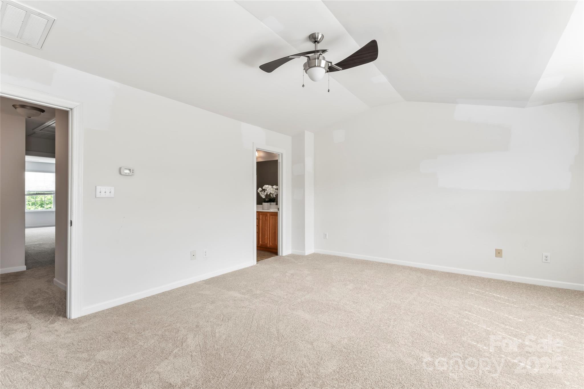 5678 Stafford Road Charlotte, NC 28215 - Photo 23 of 43 an empty room with closet and windows