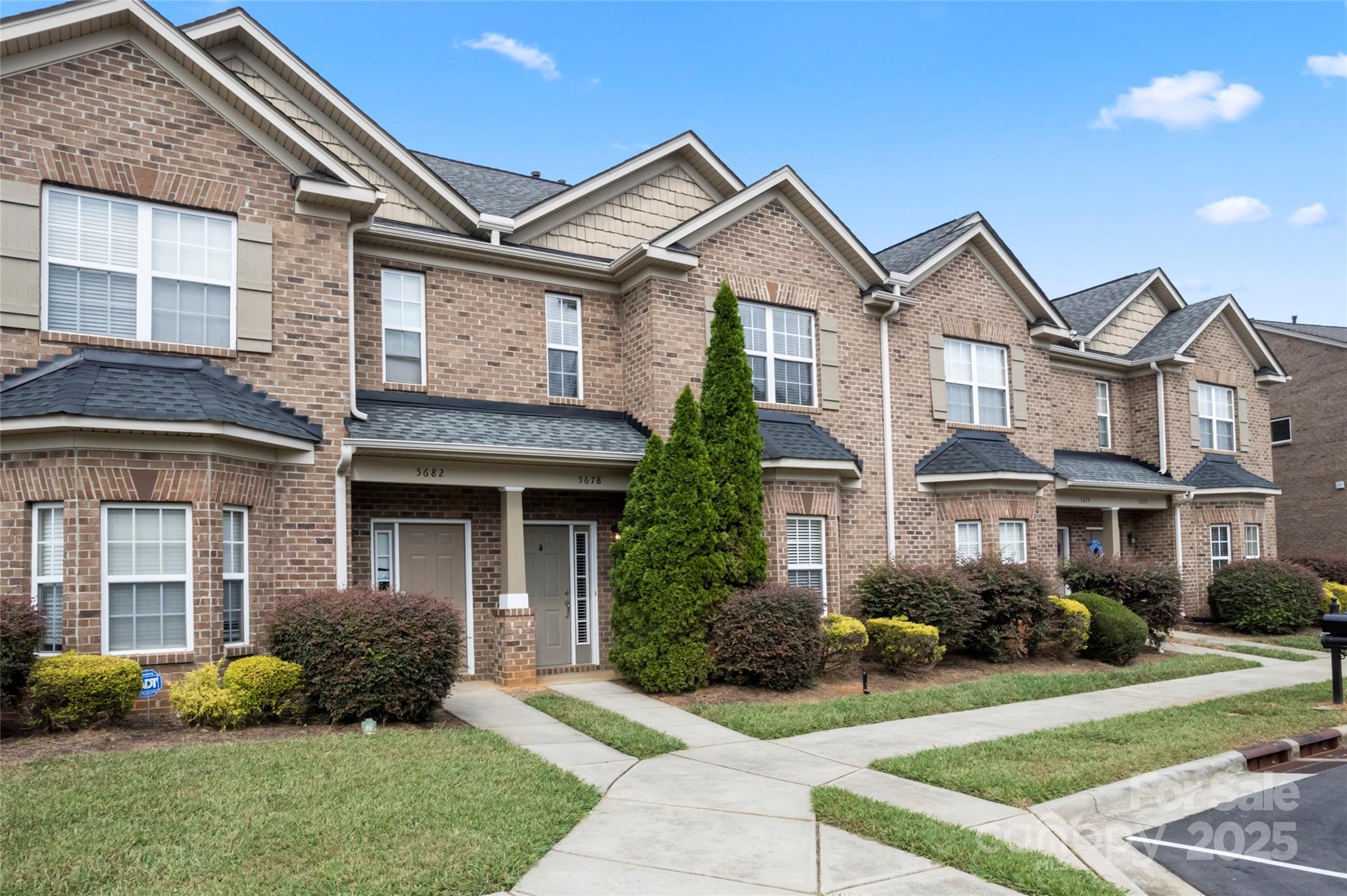 5678 Stafford Road Charlotte, NC 28215 - Photo 3 of 43 a front view of a house with garden