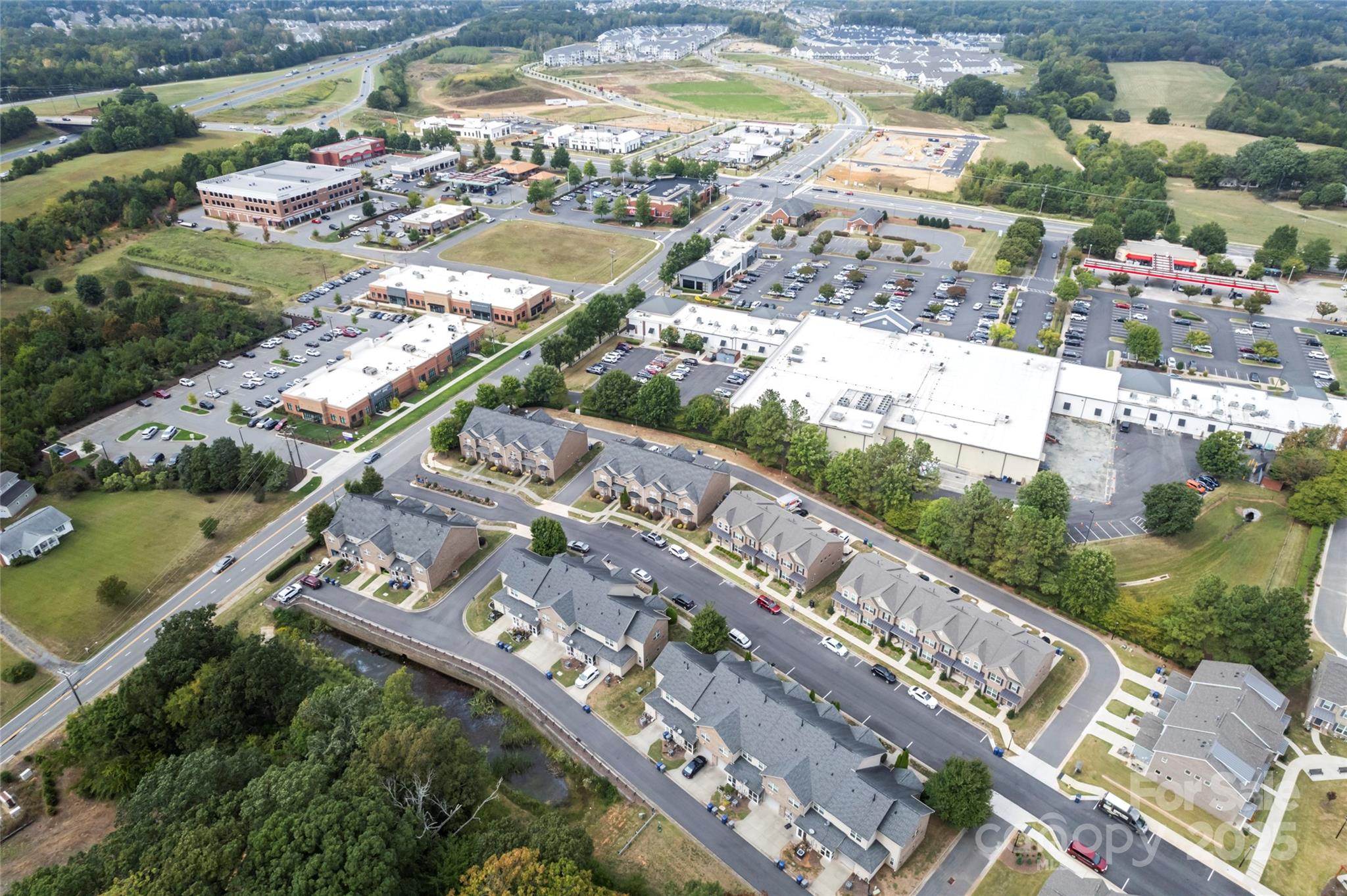 5678 Stafford Road Charlotte, NC 28215 - Photo 41 of 43 a city view with tall buildings