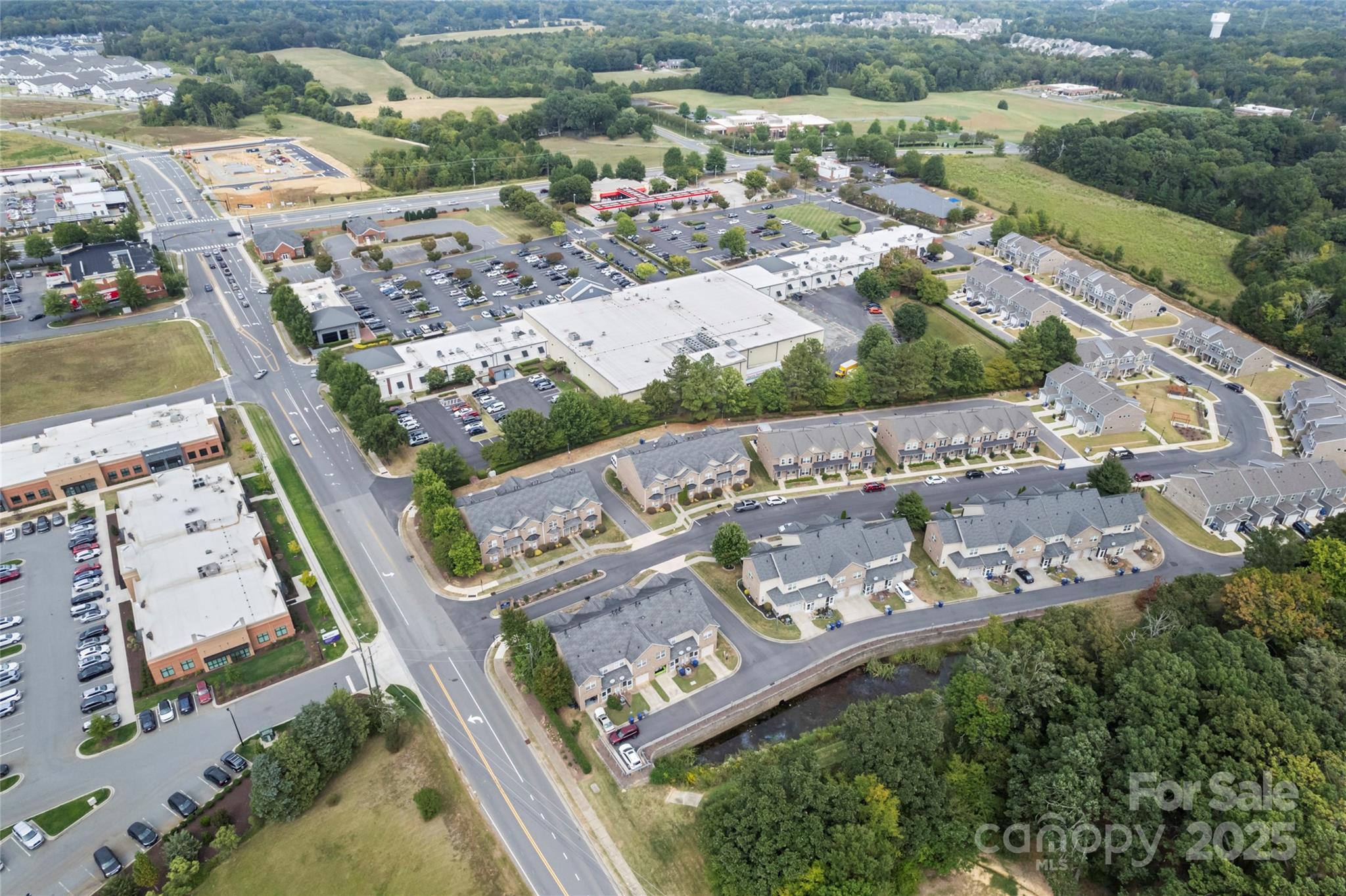 5678 Stafford Road Charlotte, NC 28215 - Photo 42 of 43 an aerial view of a residential houses with outdoor space