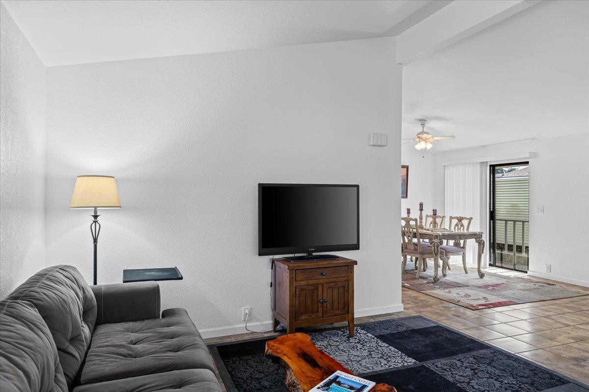 1500 Held Drive, Unit 79 Modesto, CA 95355 - Photo 9 of 58 a living room with furniture and a flat screen tv