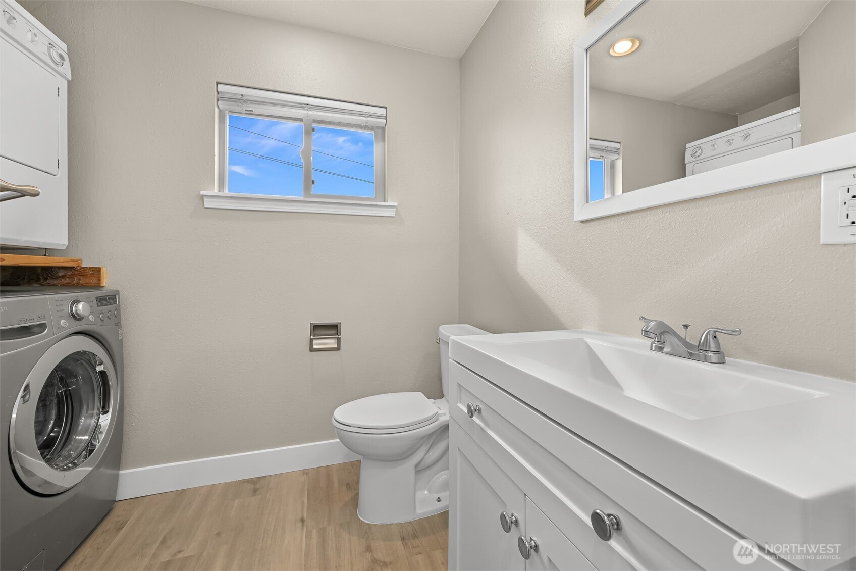 310 West 3rd Street Nooksack, WA 98276 - Photo 19 of 34 a bathroom with a sink and a toilet