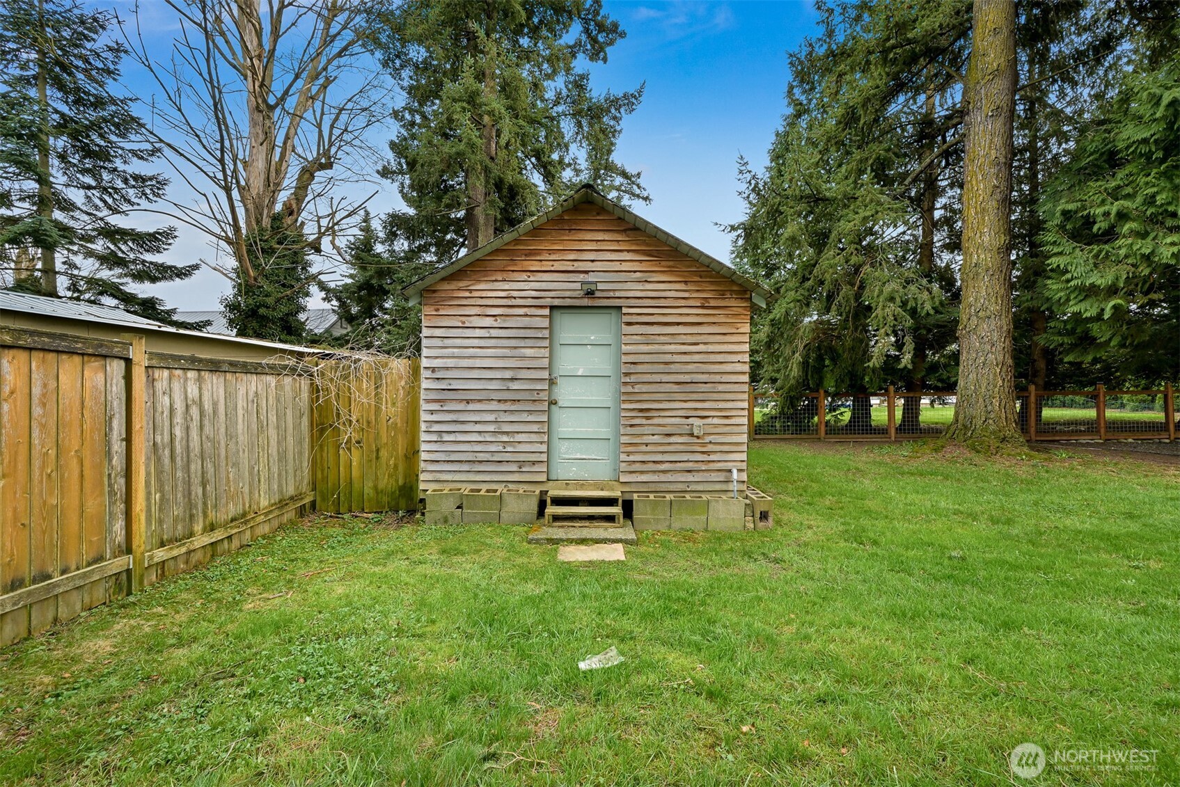 310 West 3rd Street Nooksack, WA 98276 - Photo 28 of 34 a view of a house with a yard