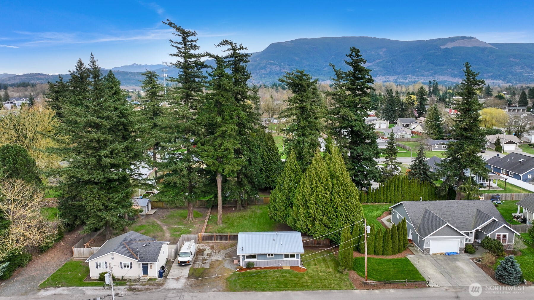 310 West 3rd Street Nooksack, WA 98276 - Photo 30 of 34 an aerial view of a house with yard