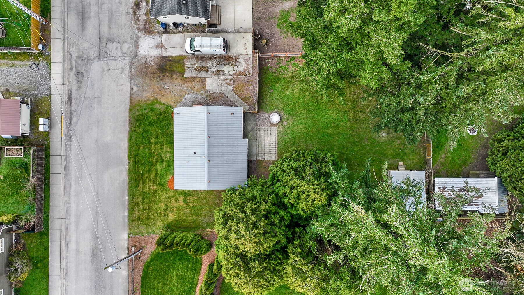 310 West 3rd Street Nooksack, WA 98276 - Photo 32 of 34 an aerial view of a house with outdoor space