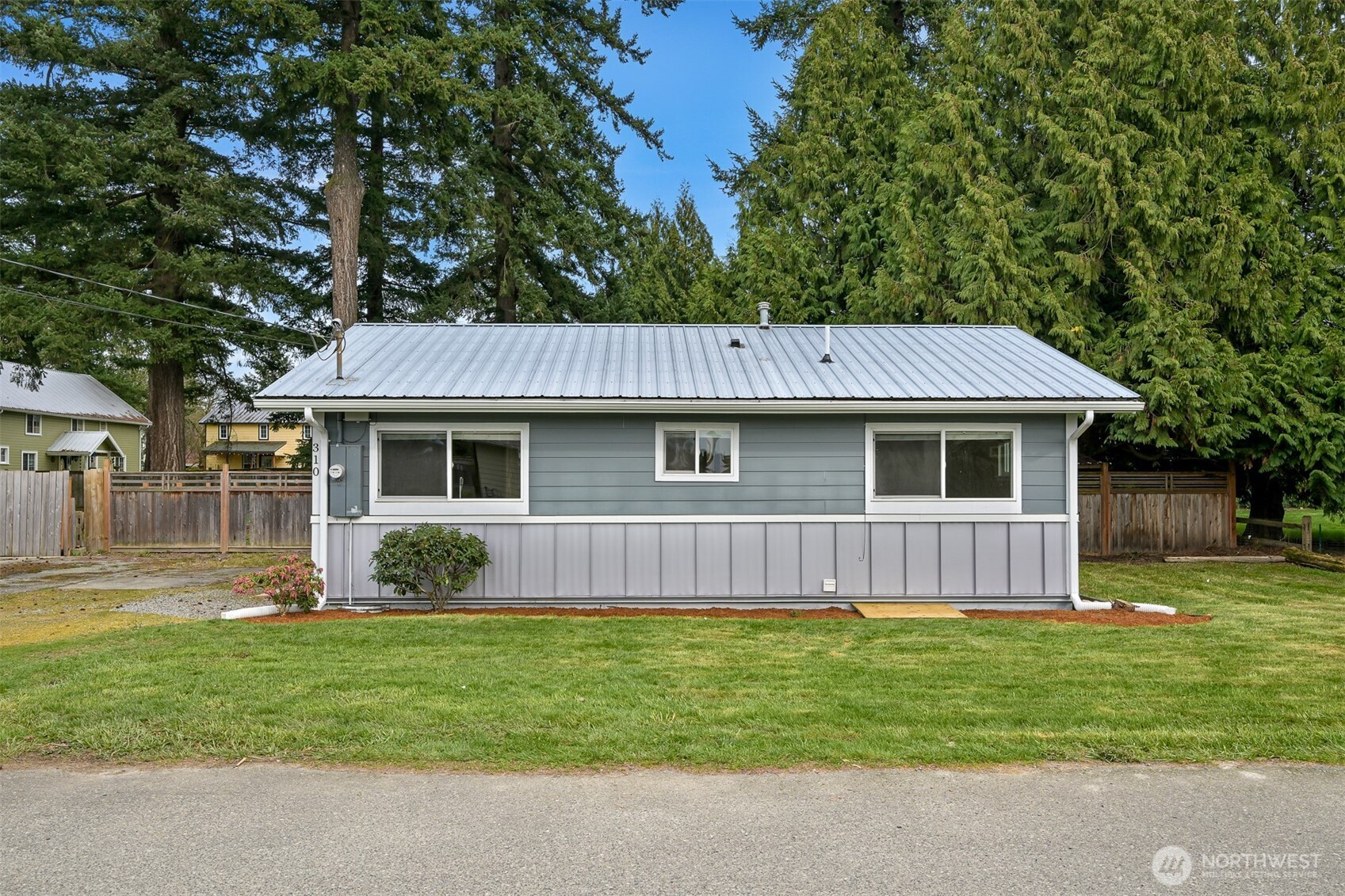 310 West 3rd Street Nooksack, WA 98276 - Photo 4 of 34 a view of a house with a yard