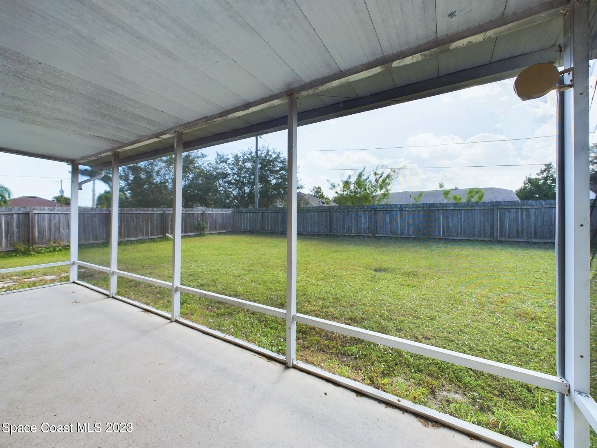 248 Benchor Road Northwest Palm Bay, FL 32907 - Photo 25 of 31 a view of a backyard