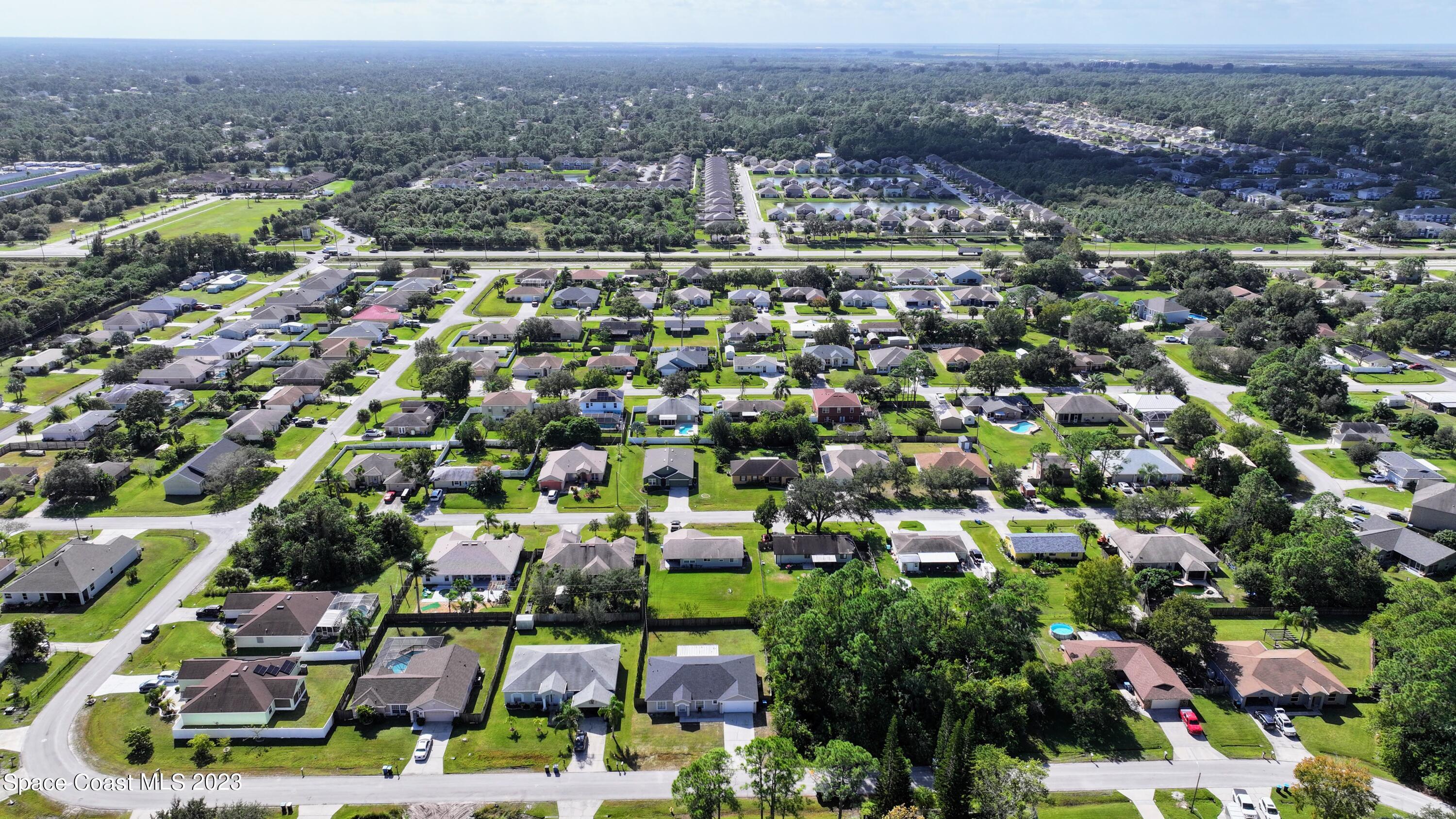 248 Benchor Road Northwest Palm Bay, FL 32907 - Photo 29 of 31 an aerial view of a city