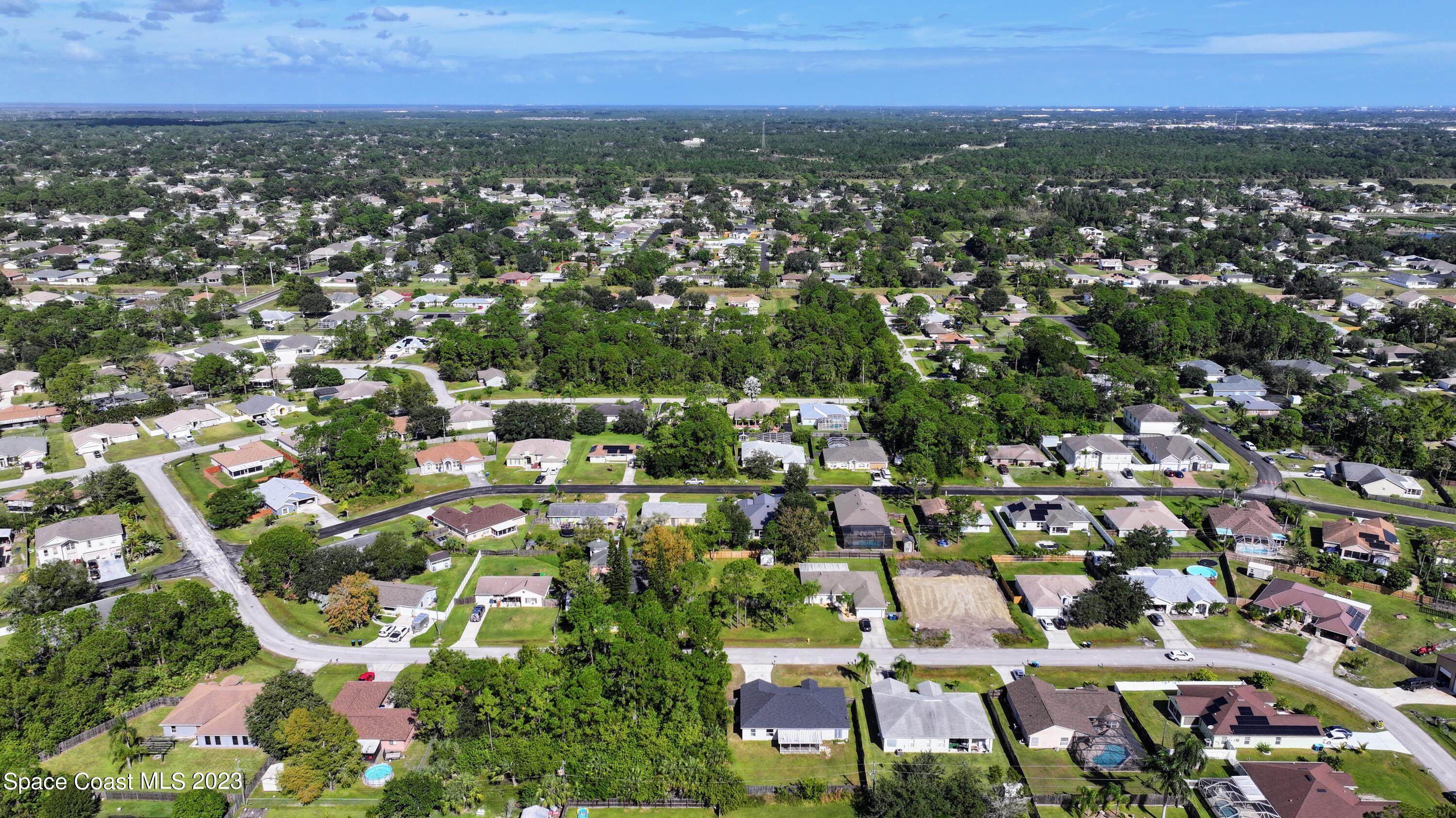 248 Benchor Road Northwest Palm Bay, FL 32907 - Photo 31 of 31 an aerial view of multiple house