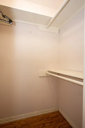 a view of a room with racks on the wall