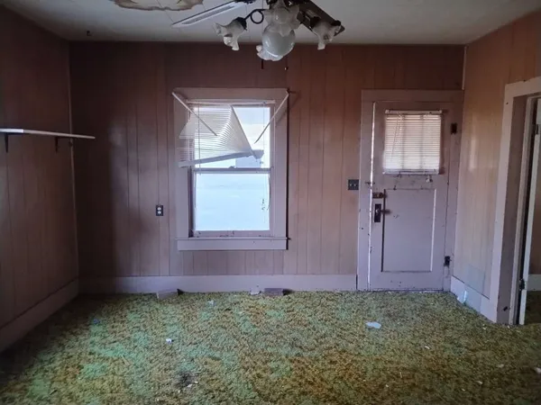 an empty room with windows