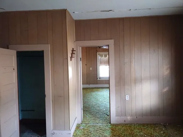a view of a hallway with closet