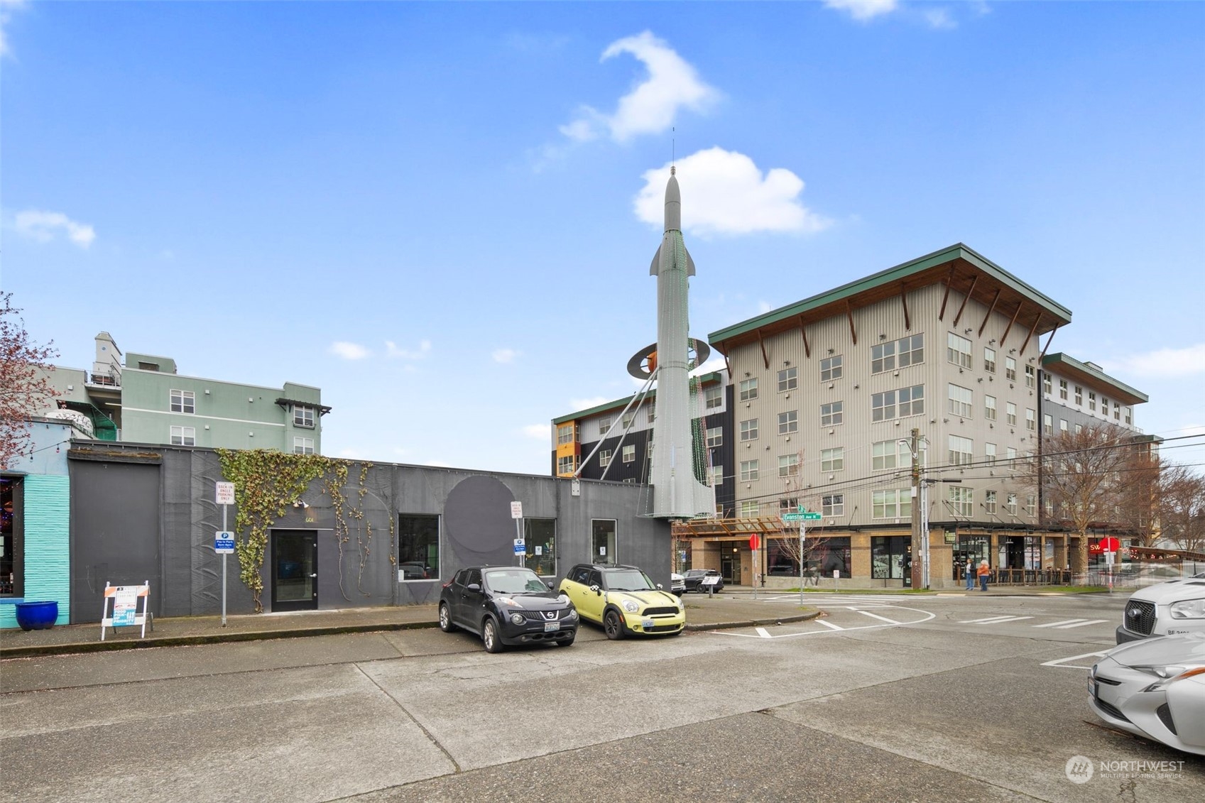 3625 Evanston Avenue North, Unit B Seattle, WA 98103 - Photo 34 of 37 a view of a building with car parked