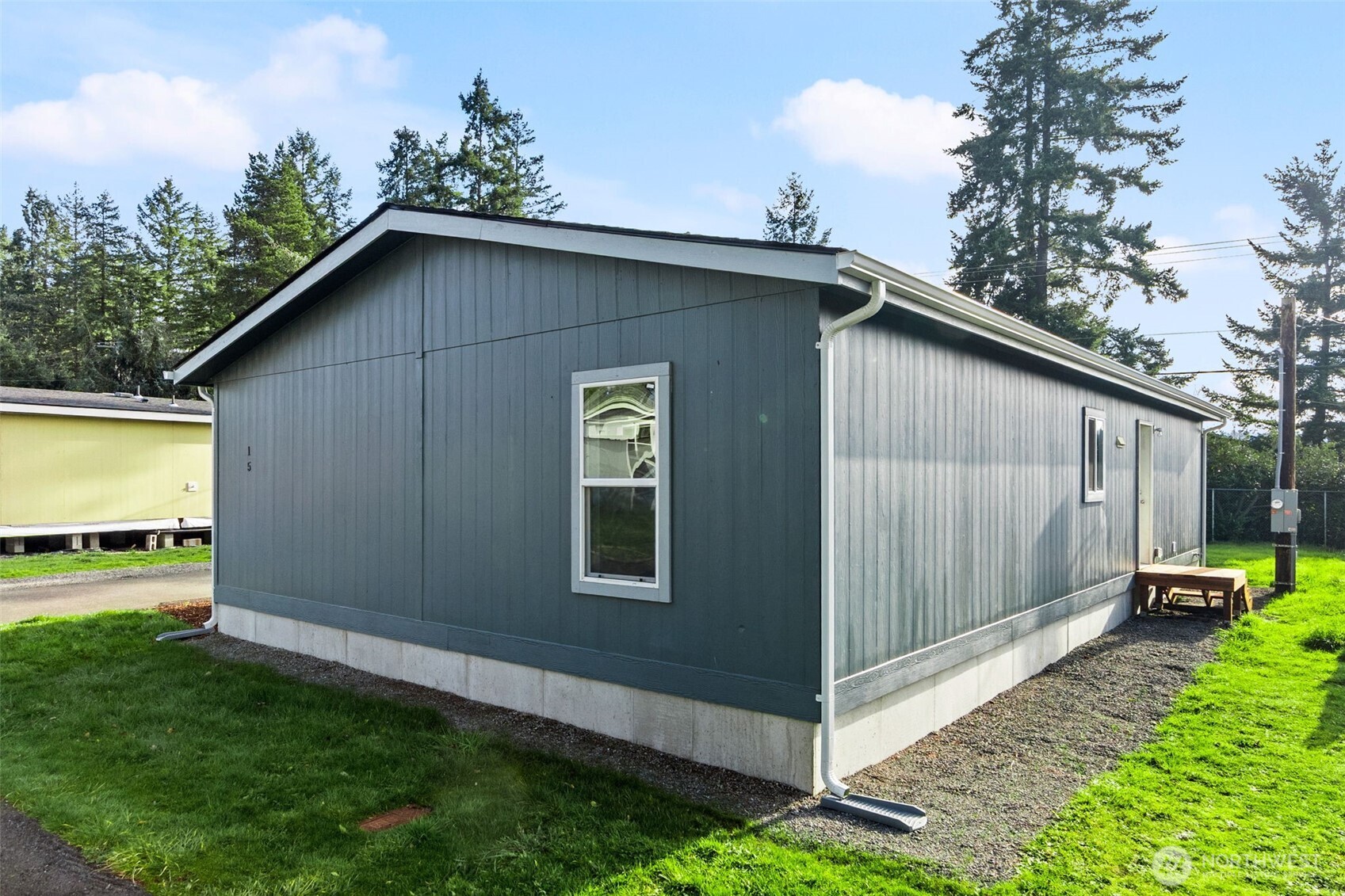 6748 Fir Tree Road Southeast, Unit 15 Olympia, WA 98513 - Photo 28 of 28 a view of a backyard with a garden