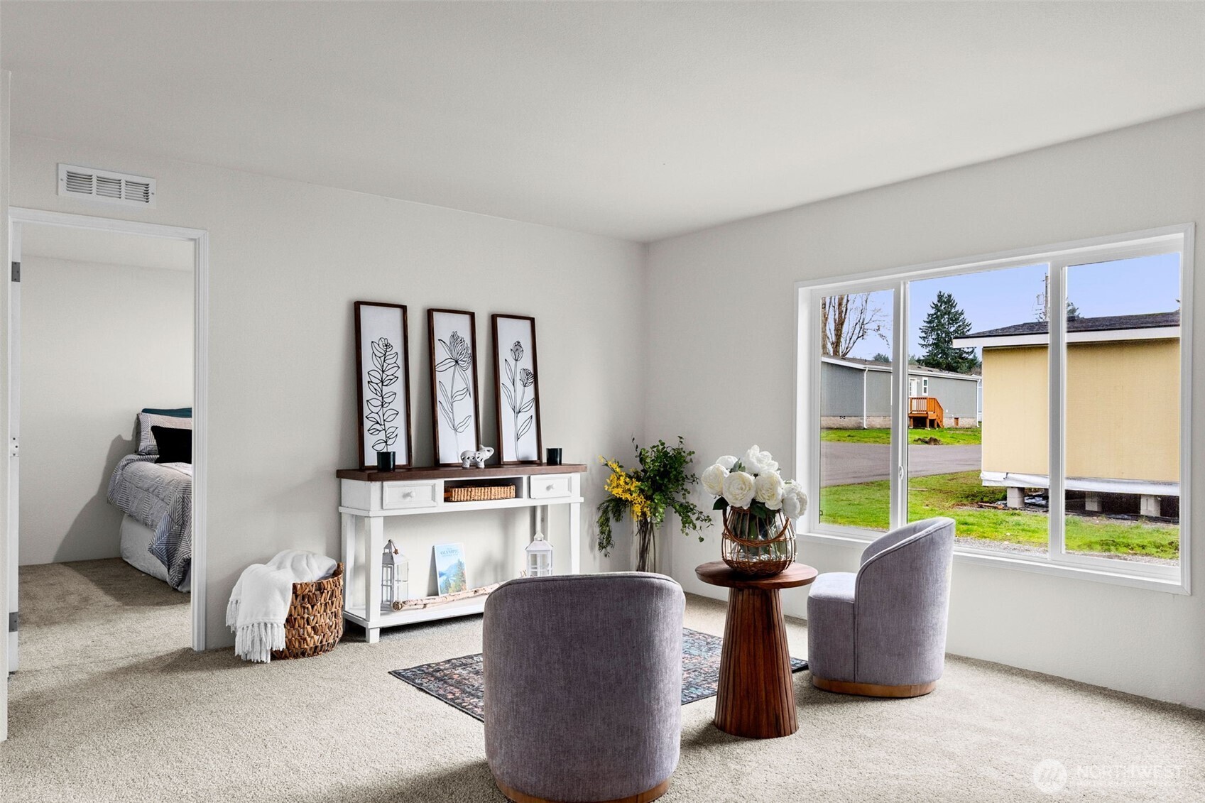 6748 Fir Tree Road Southeast, Unit 15 Olympia, WA 98513 - Photo 7 of 28 a living room with furniture fireplace and large window