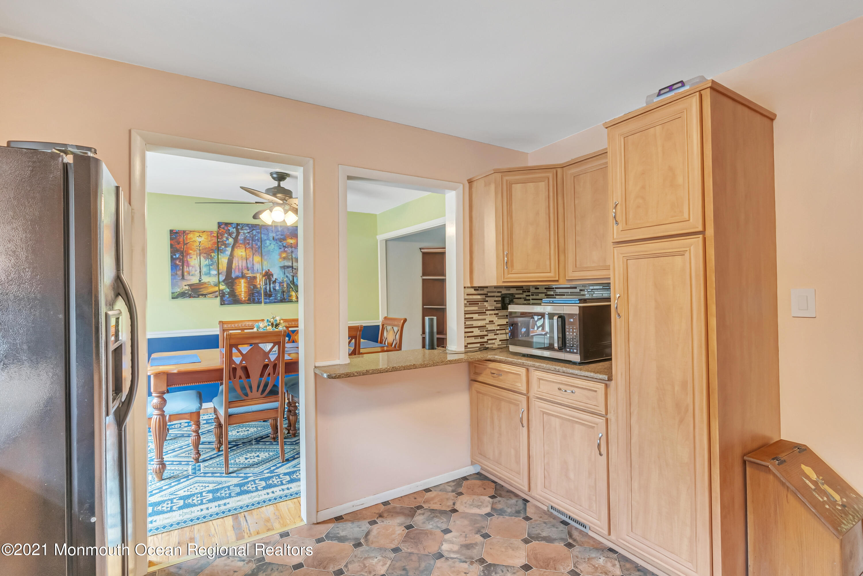 87 Jackson Mills Road Jackson, NJ 08527 - Photo 13 of 32 a kitchen with stainless steel appliances granite countertop a refrigerator and a stove