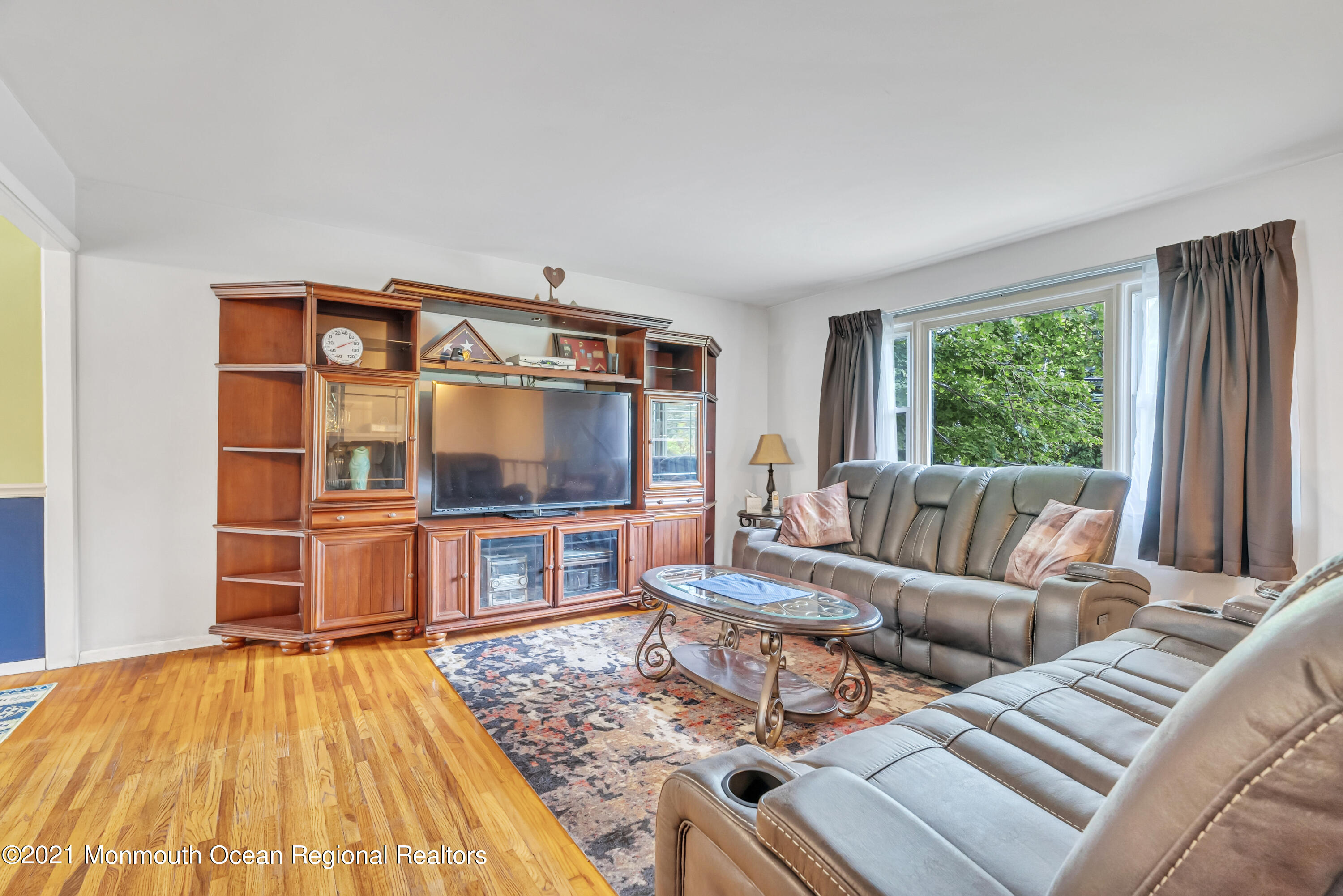 87 Jackson Mills Road Jackson, NJ 08527 - Photo 17 of 32 a living room with furniture and a flat screen tv
