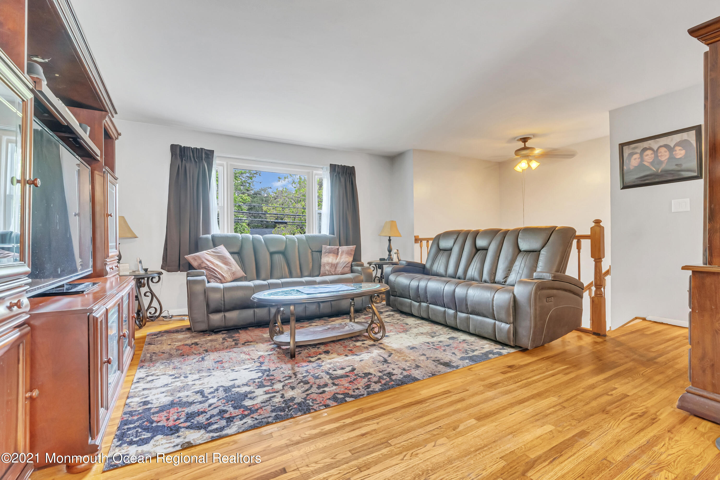 87 Jackson Mills Road Jackson, NJ 08527 - Photo 18 of 32 a living room with furniture and a flat screen tv