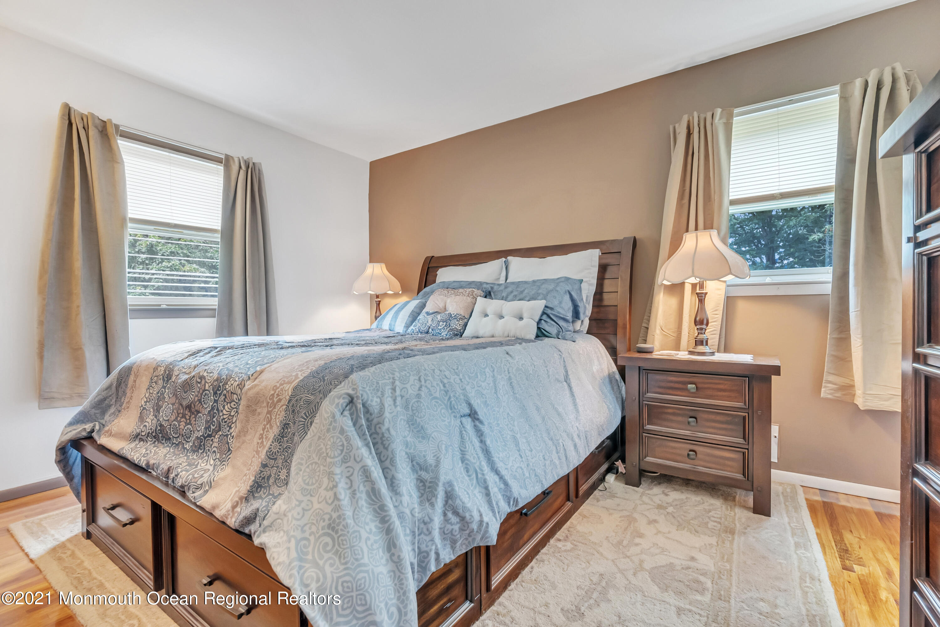 87 Jackson Mills Road Jackson, NJ 08527 - Photo 20 of 32 a bedroom with a bed and large windows