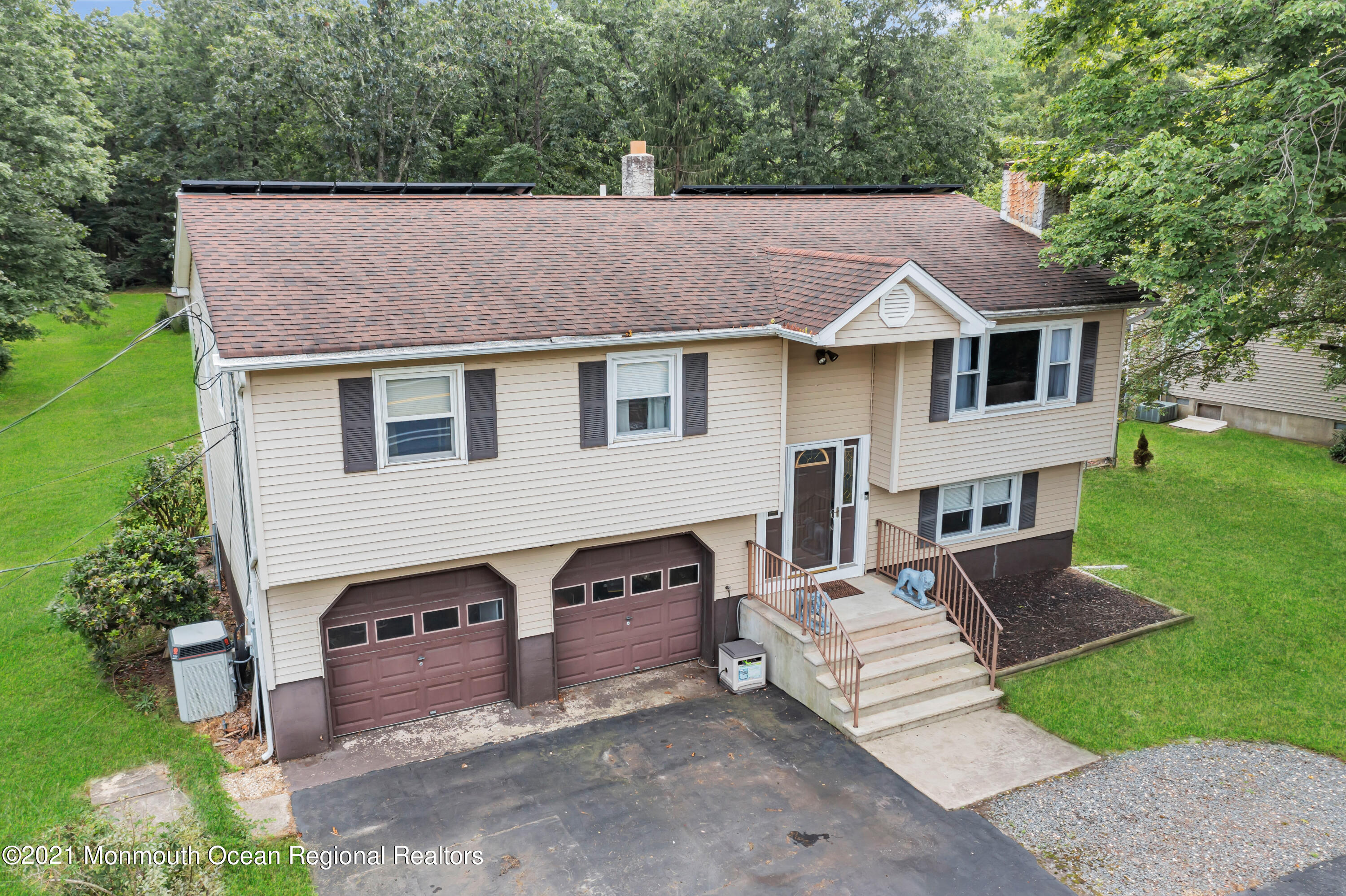 87 Jackson Mills Road Jackson, NJ 08527 - Photo 3 of 32 a house view with a garden space