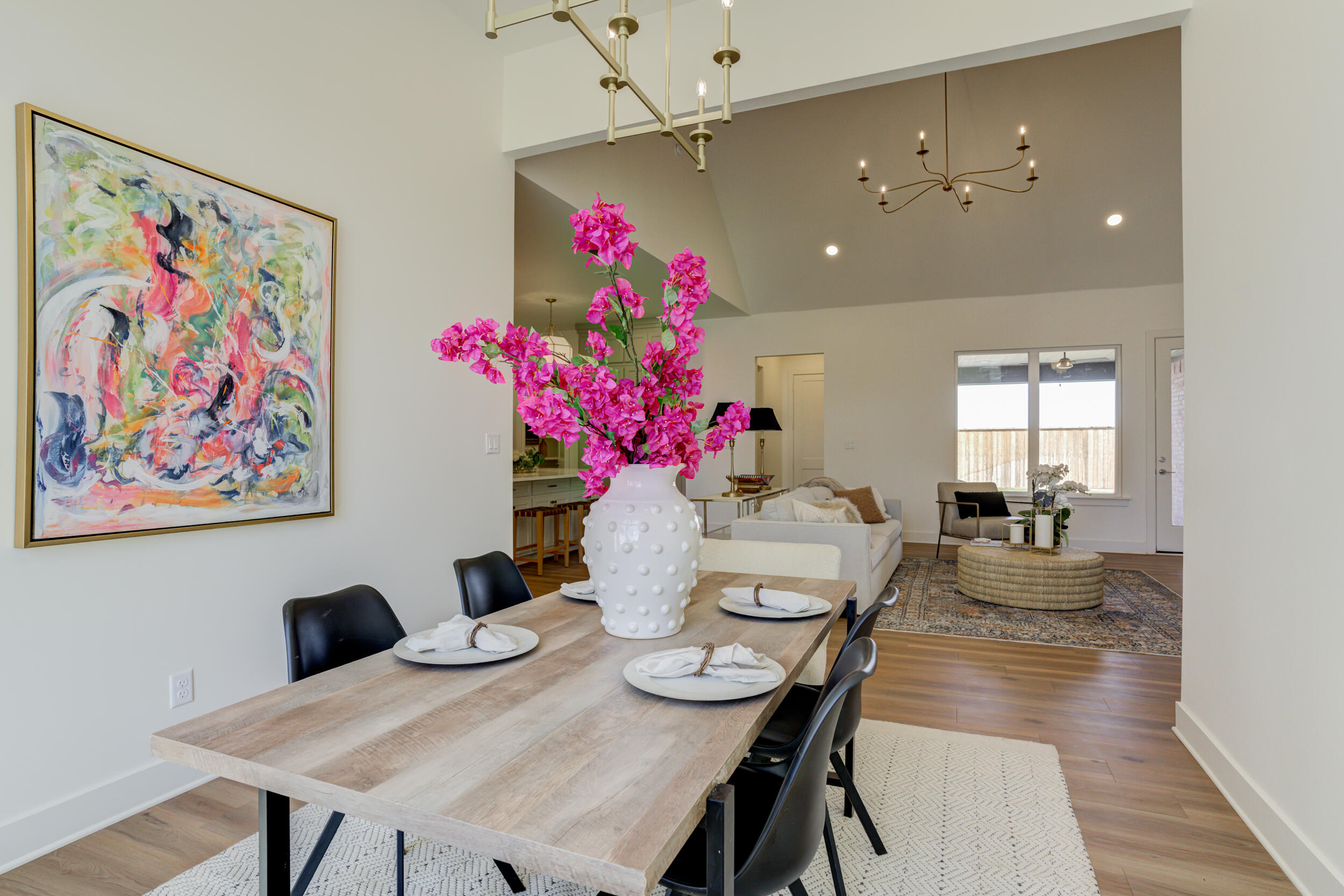 4610 138th Place Lubbock, TX 79424 - Photo 24 of 52 a view of a dining room with furniture and chandelier