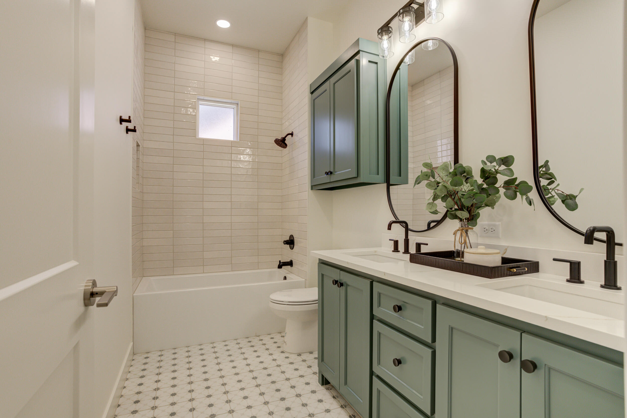 4610 138th Place Lubbock, TX 79424 - Photo 42 of 52 a bathroom with a sink a toilet and shower