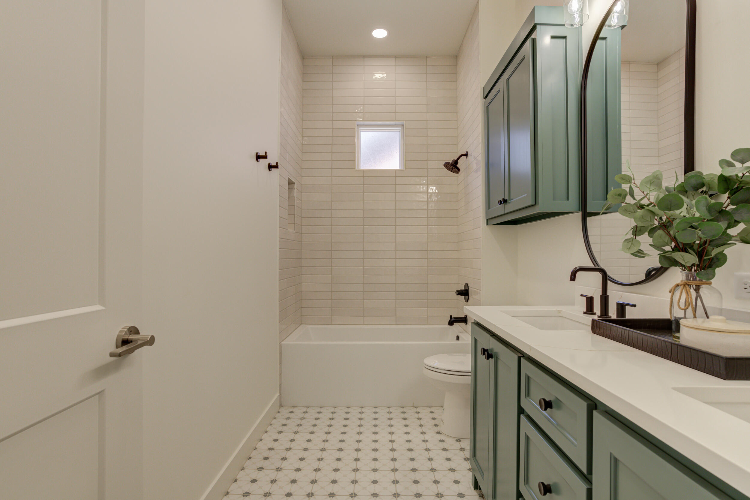 4610 138th Place Lubbock, TX 79424 - Photo 43 of 52 a bathroom with a sink a toilet and shower